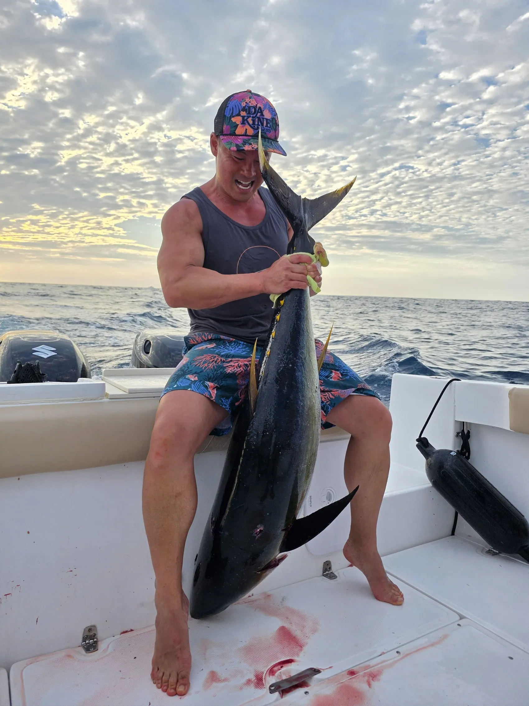 Crew handling the fresh catch on deck off Playa Garza
