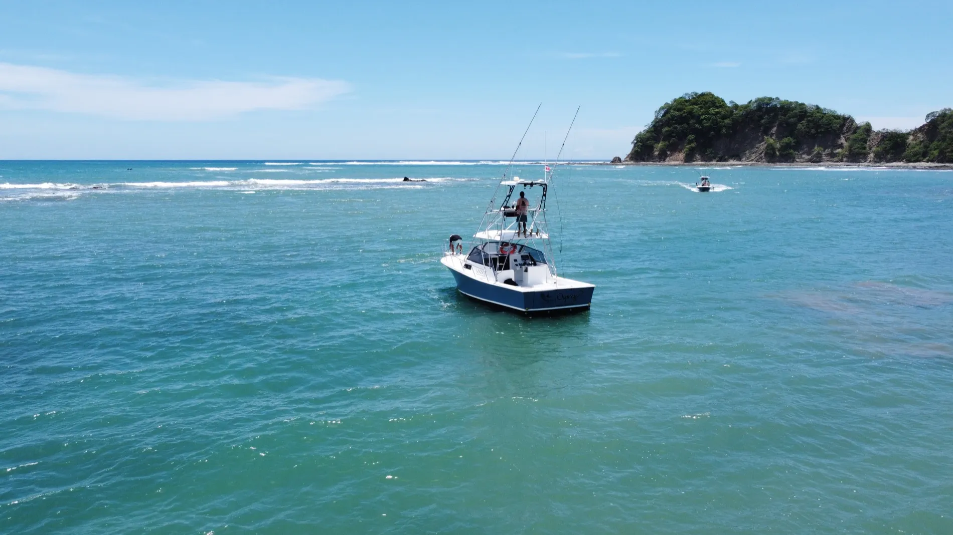 A Monkey Head boat off the Playa Garza coast, Nosara, from the air