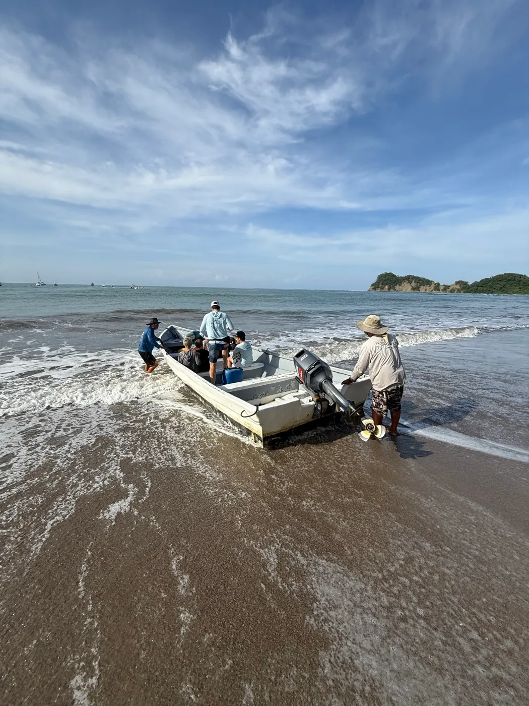 Guests boarding the panga water taxi on Playa Garza