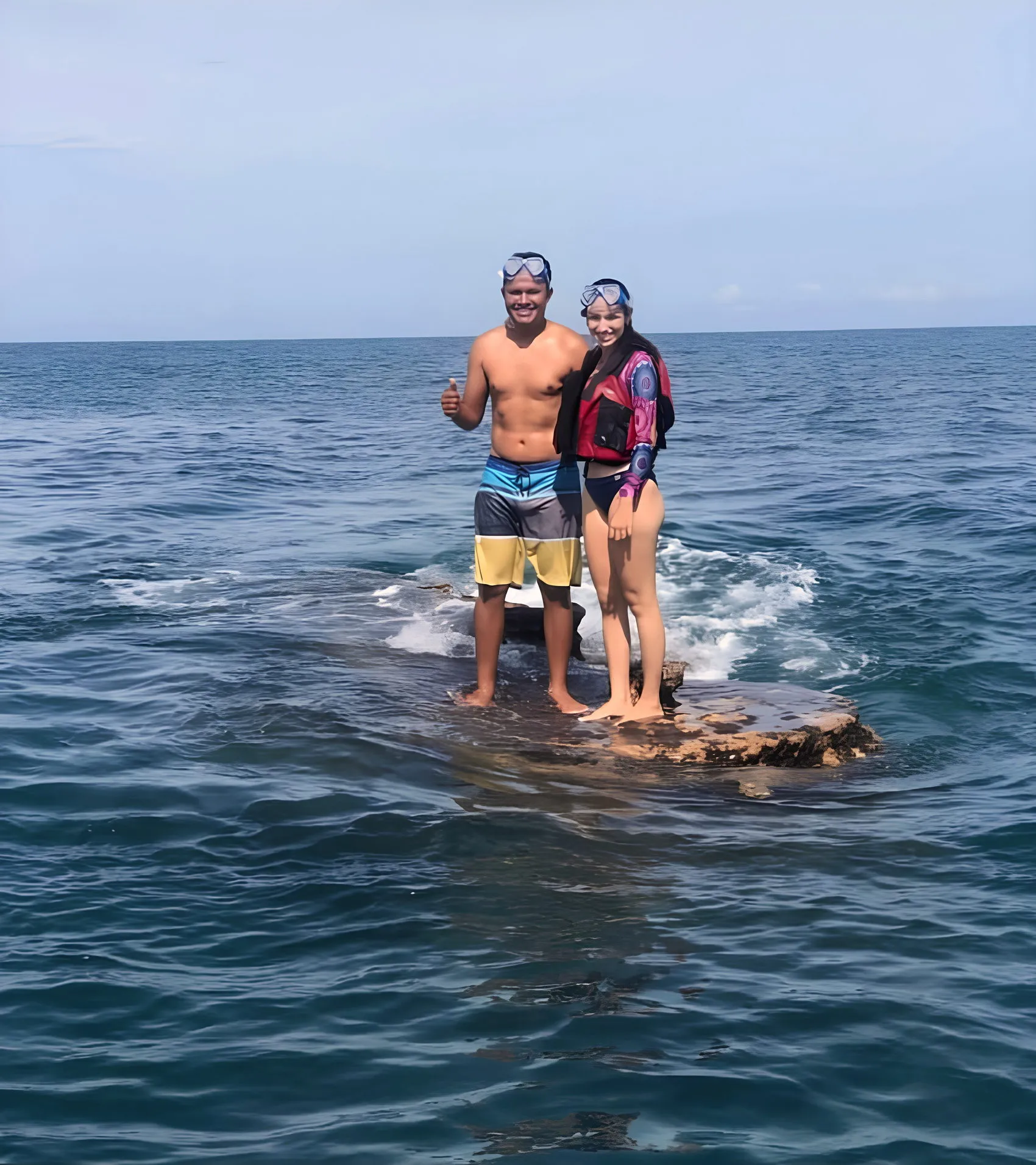 Guests standing on the rock at Pink Island