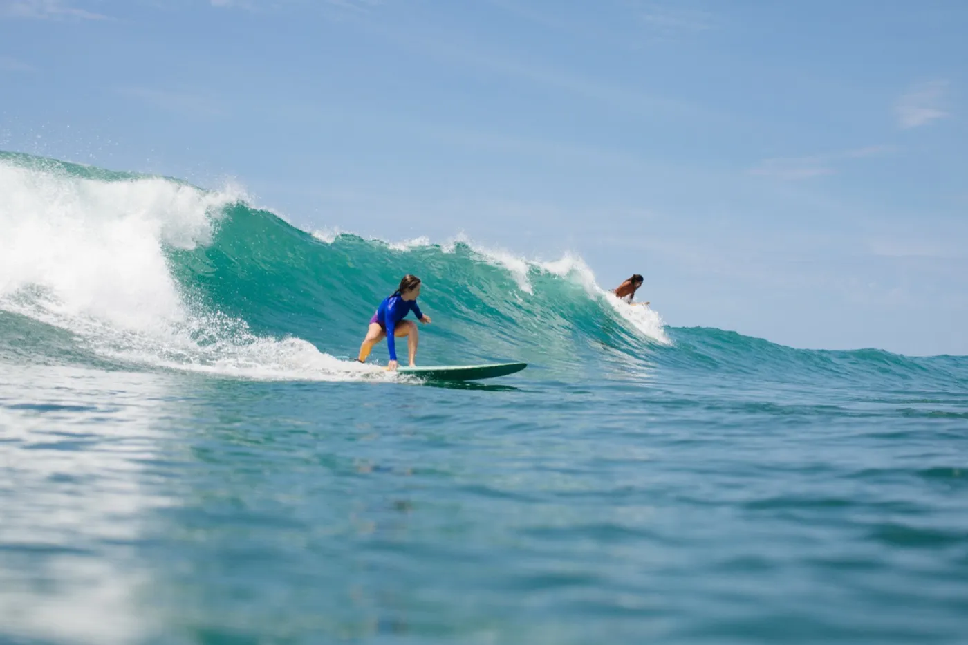 A surfer on a clean wave off Nosara